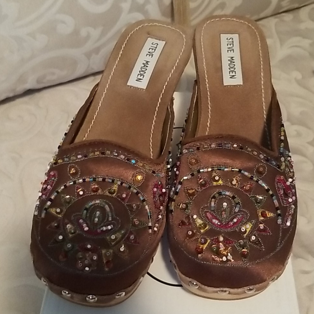 Steve madden wood clogs.